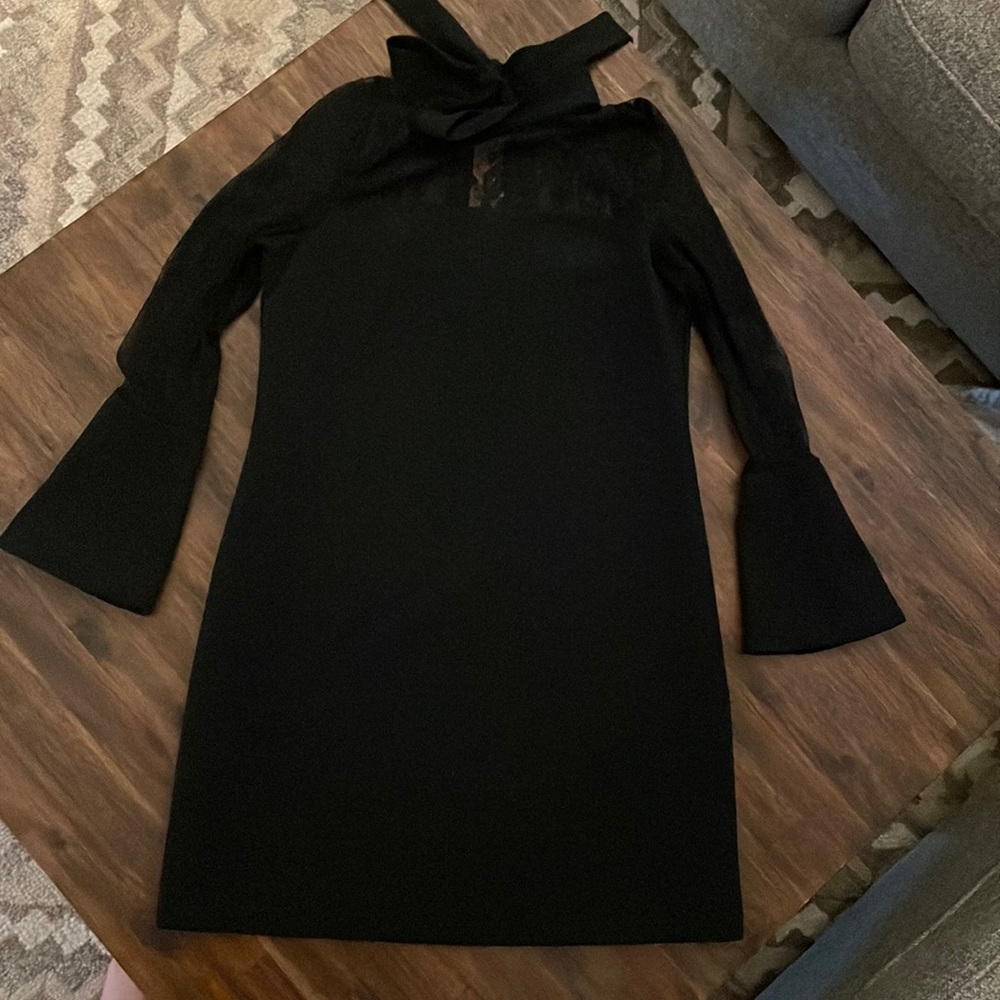 Black lace cocktail dress with bell sleeves